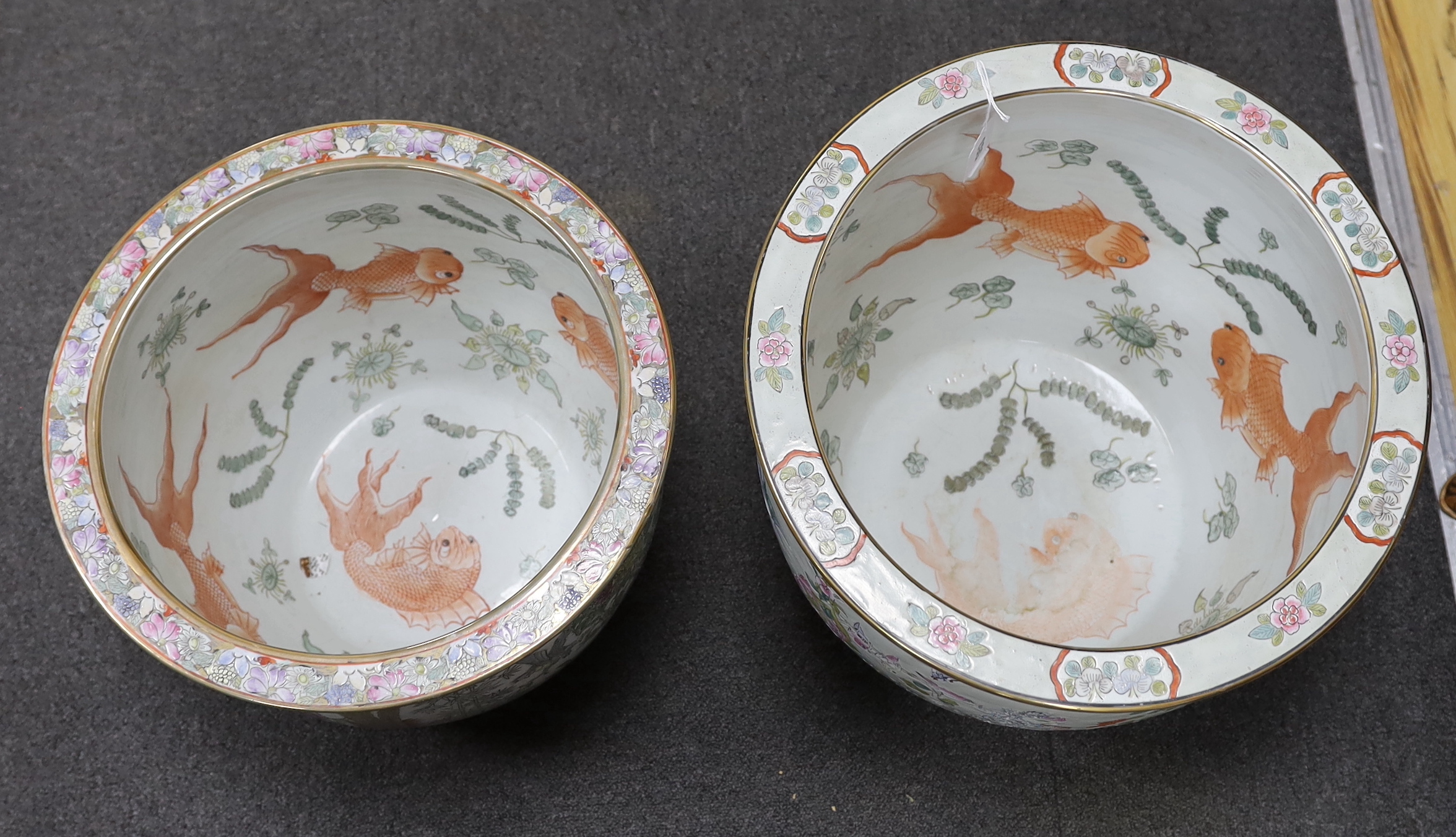 Two Chinese enamelled porcelain fish bowls, decorated with phoenixes and other birds, largest 42cm in diameter